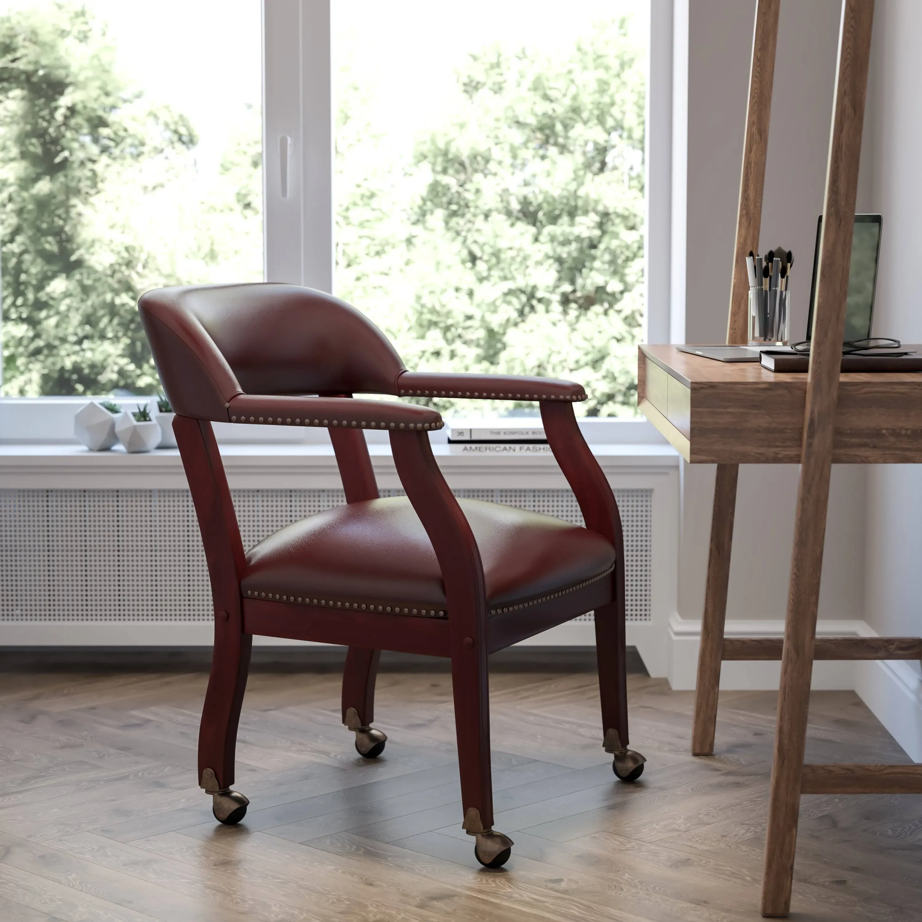 Sarah Oxblood Vinyl Luxurious Conference Chair with Accent Nail Trim and Casters