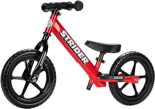 Strider 12” Sport Bike - No Pedal Balance Bicycle for Kids 18 Months to 5 Years - Includes Safety Pad, Padded Seat, Mini Grips & Flat-Free Tires - Tool-Free Assembly & Adjustments