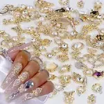 Dornail 50pcs Gold Nail Charms for Acrylic Nails, Mix Styles Shiny Pearl Alloy Nail Rhinestones Flower Butterfly Heart Star Charms for Nails Women Nail Jewels Nail Decorations for Nail Art Charms